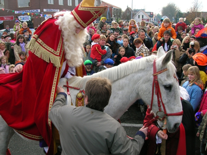 Children's friend Sinterklaas on his white horse.